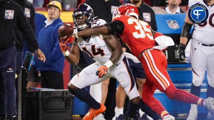 Jaylen Watson (35) breaks up a pass intended for Denver Broncos wide receiver Courtland Sutton (14) during the second half at GEHA Field at Arrowhead Stadium.