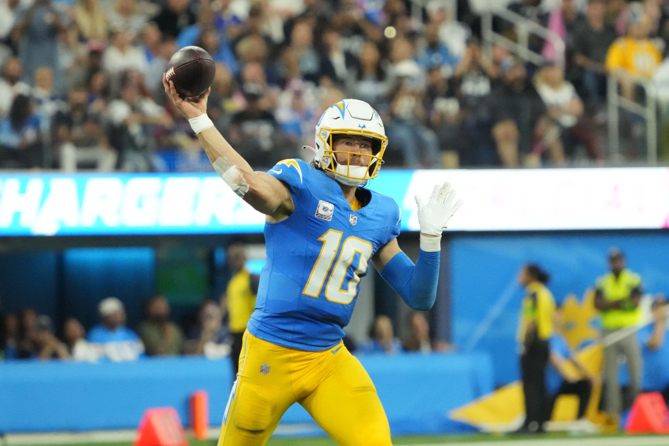 Los Angeles Chargers quarterback Justin Herbert (10) throws the ball against the Dallas Cowboys in the second half at SoFi Stadium.