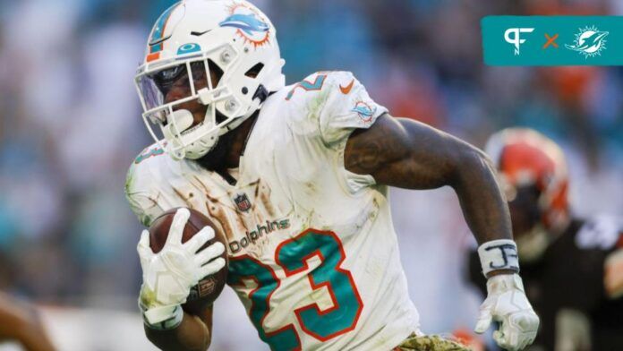 Jeff Wilson Jr. (23) runs with the football for a touchdown during the fourth quarter against the Cleveland Browns at Hard Rock Stadium.