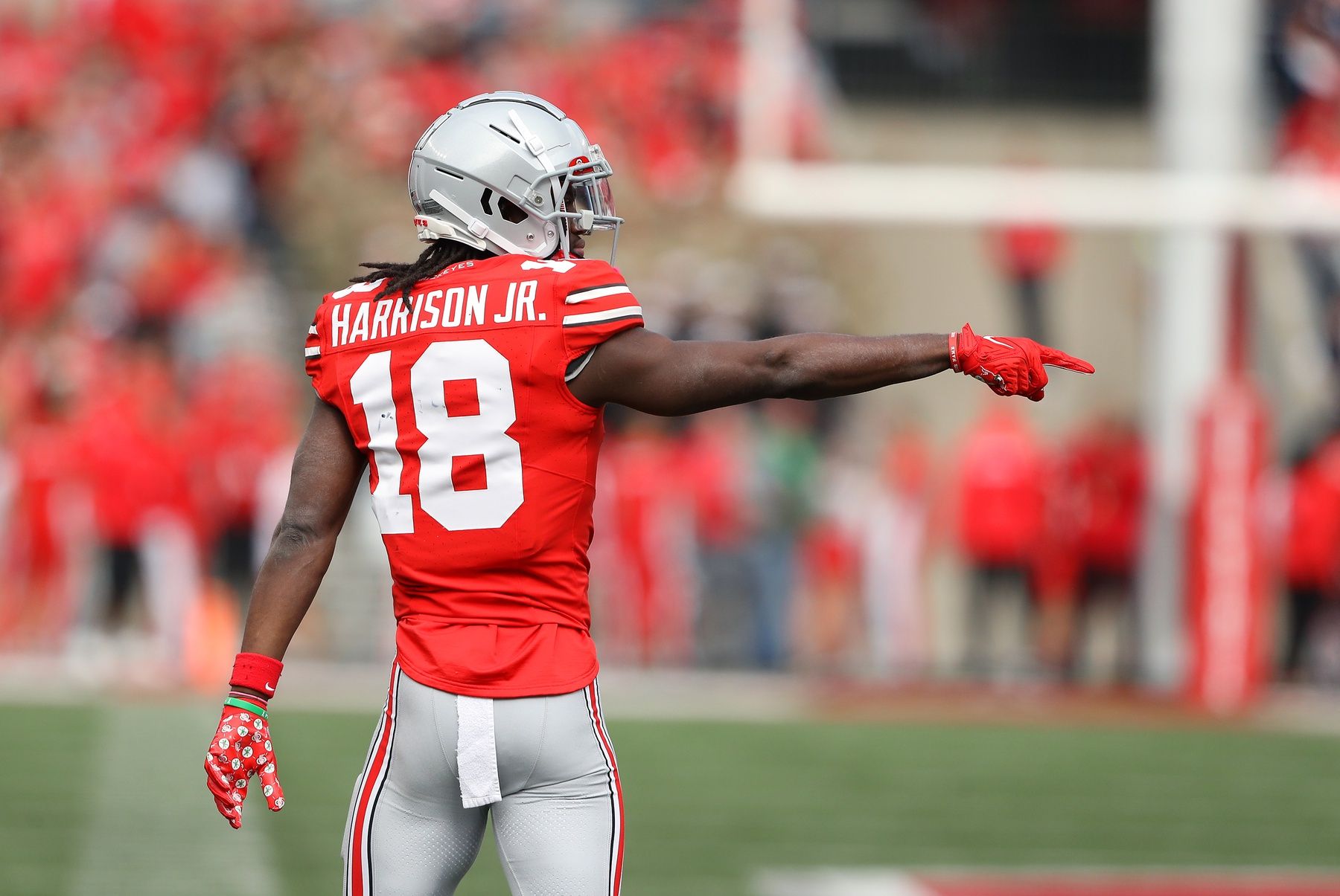 Marvin Harrison Jr. (18) points out a flag that overturned a turnover during the second quarter against the Penn State Nittany Lions at Ohio Stadium.