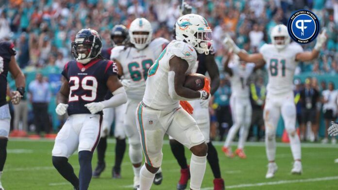 Miami Dolphins running back Jeff Wilson Jr. (23) rushes for a touchdown during the first half against the Houston Texans at Hard Rock Stadium.