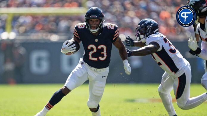 Chicago Bears running back Roschon Johnson (23) runs with the ball against the Denver Broncos at Soldier Field.