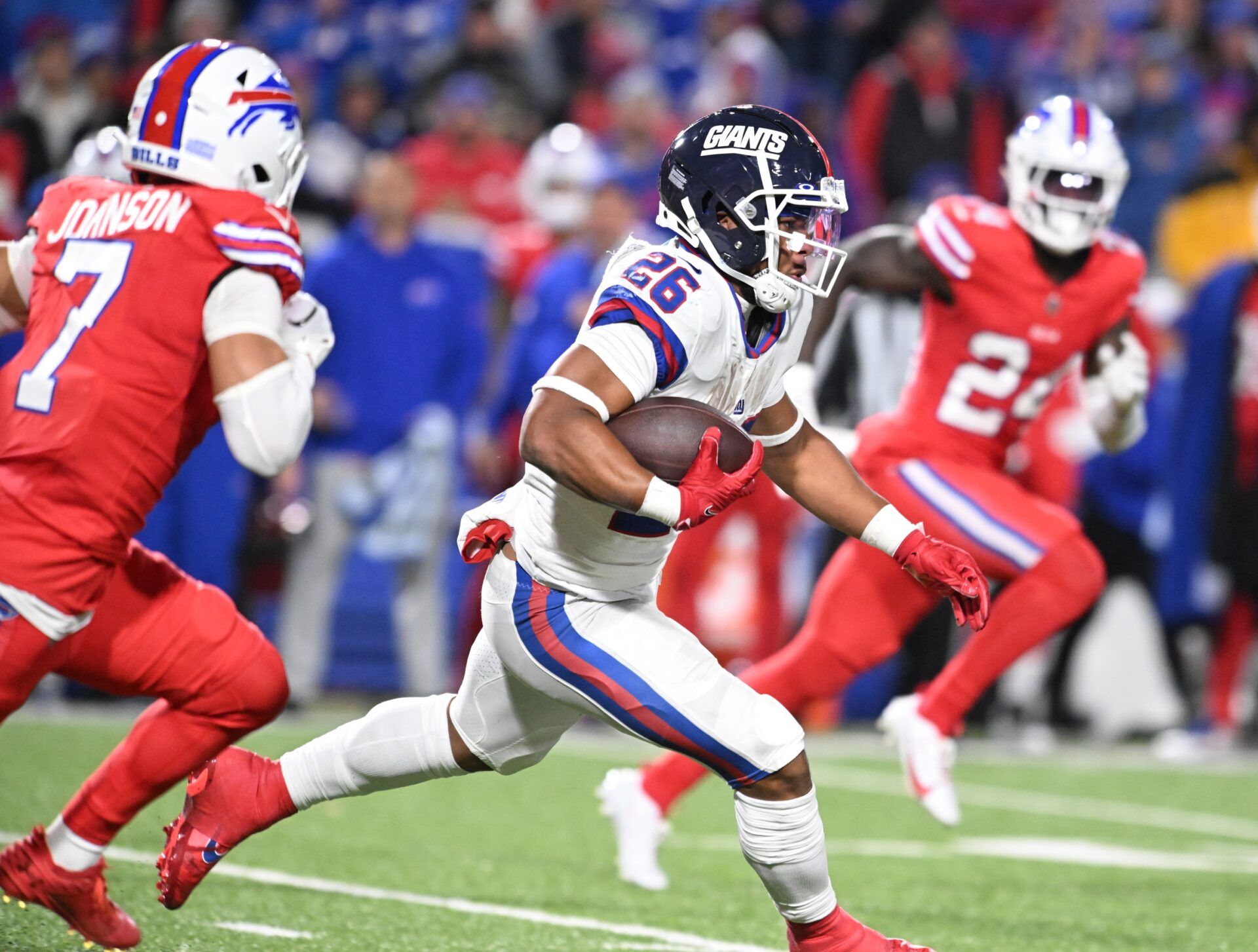 New York Giants RB Saquon Barkley (26) rushes the ball against the Buffalo Bills.