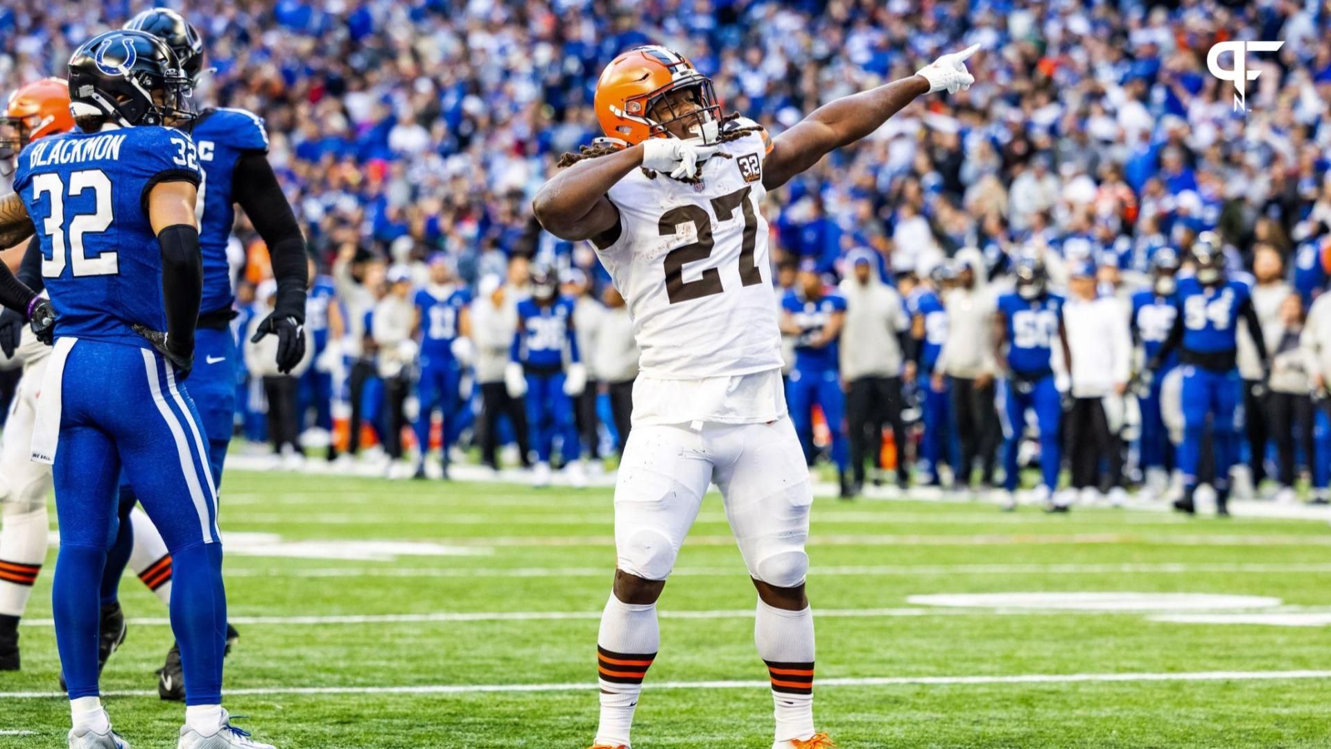 Kareem Hunt (27) celebrates his game winning touchdown in the second half against the Indianapolis Colts at Lucas Oil Stadium.