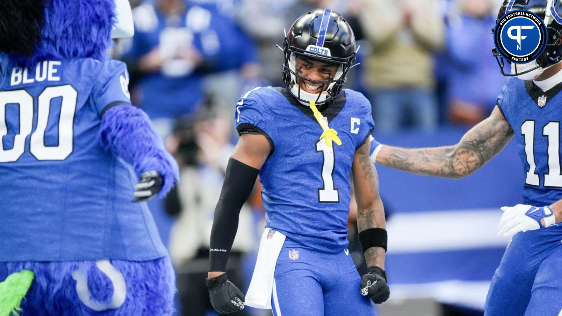 Josh Downs (1) is congratulated after scoring a touchdown.