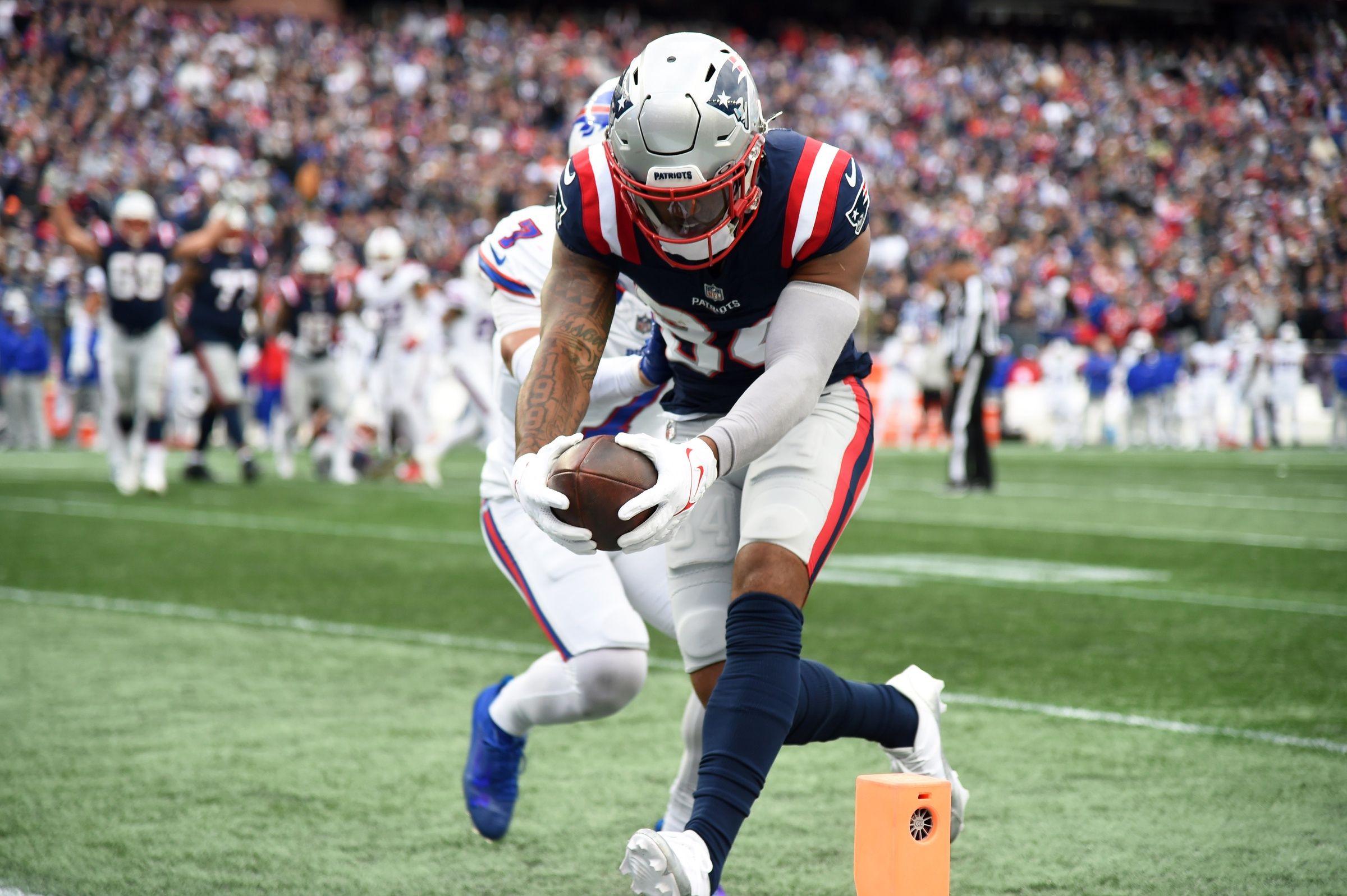 Kendrick Bourne (84) crosses the goalie for a touchdown during the second half against the Buffalo Bills at Gillette Stadium.