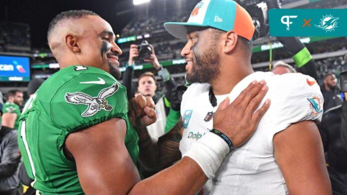 Philadelphia Eagles quarterback Jalen Hurts (1) and Miami Dolphins quarterback Tua Tagovailoa (1) meet on the field after Eagles win at Lincoln Financial Field.