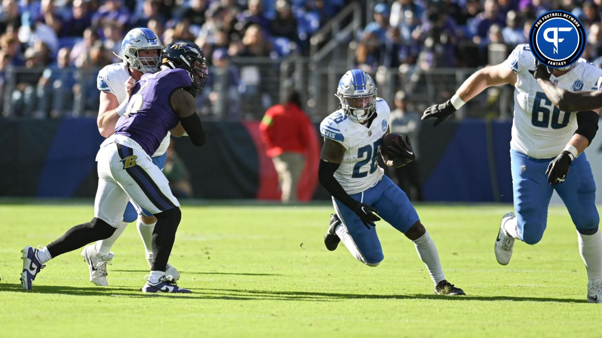 Detroit Lions running back Jahmyr Gibbs (26) rushes dung the second half against the Detroit Lions at M&T Bank Stadium.