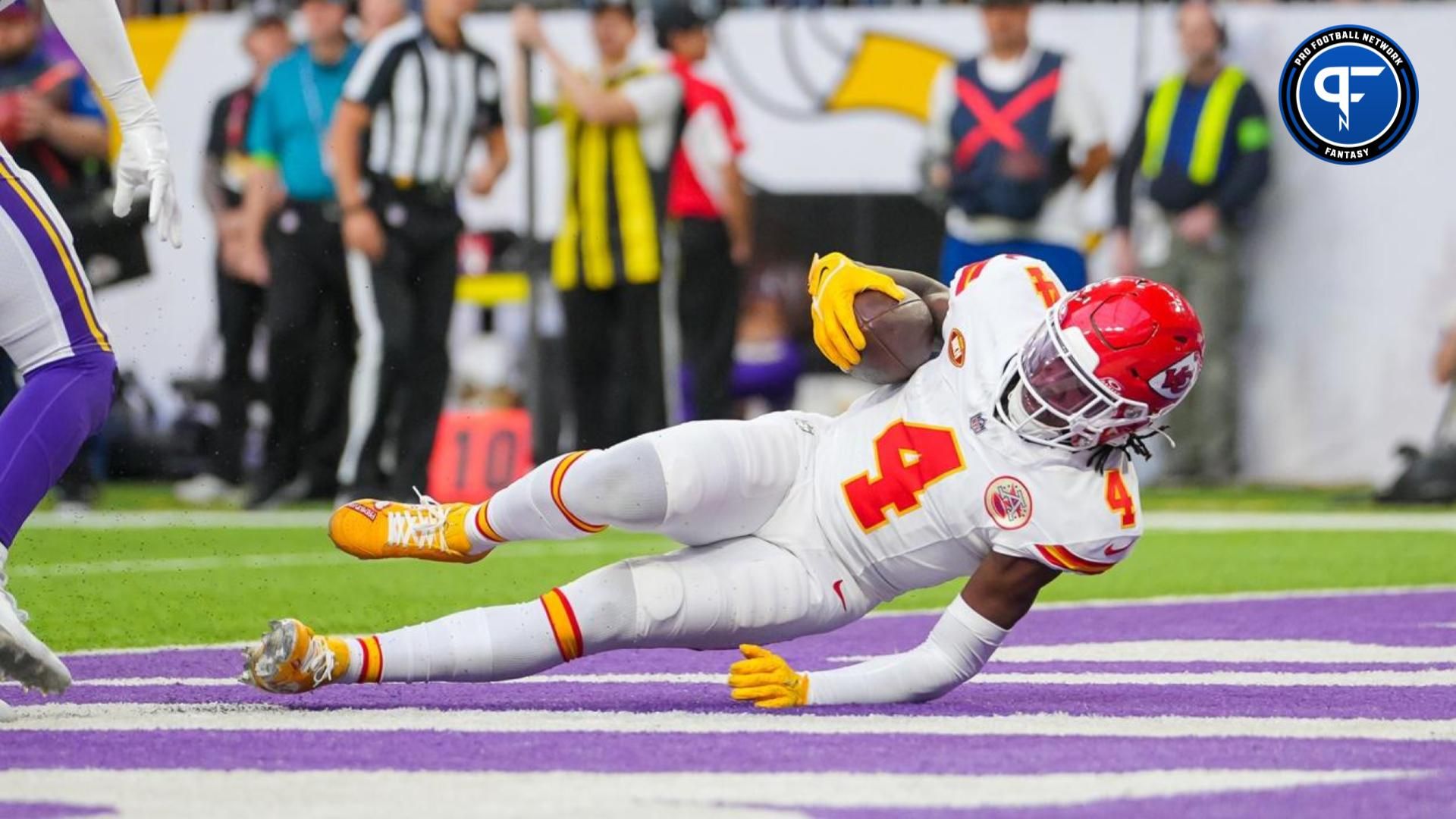 Kansas City Chiefs wide receiver Rashee Rice (4) catches a pass for a touchdown against the Minnesota Vikings.
