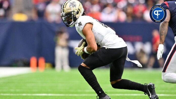 New Orleans Saints WR Chris Olave (12) runs after the catch against the Houston Texans.