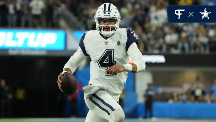 Dallas Cowboys QB Dak Prescott (4) runs with the ball.