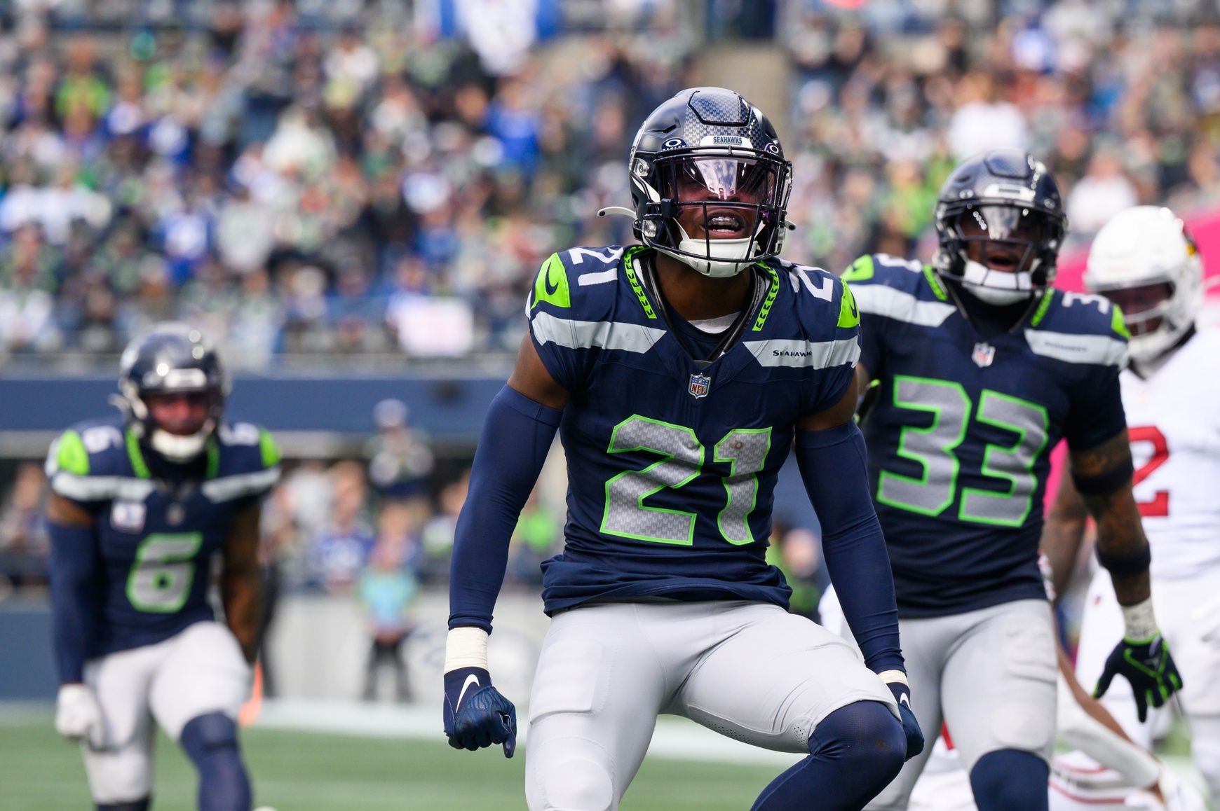 Seattle Seahawks CB Devon Witherspoon (21) reacts after making a play.