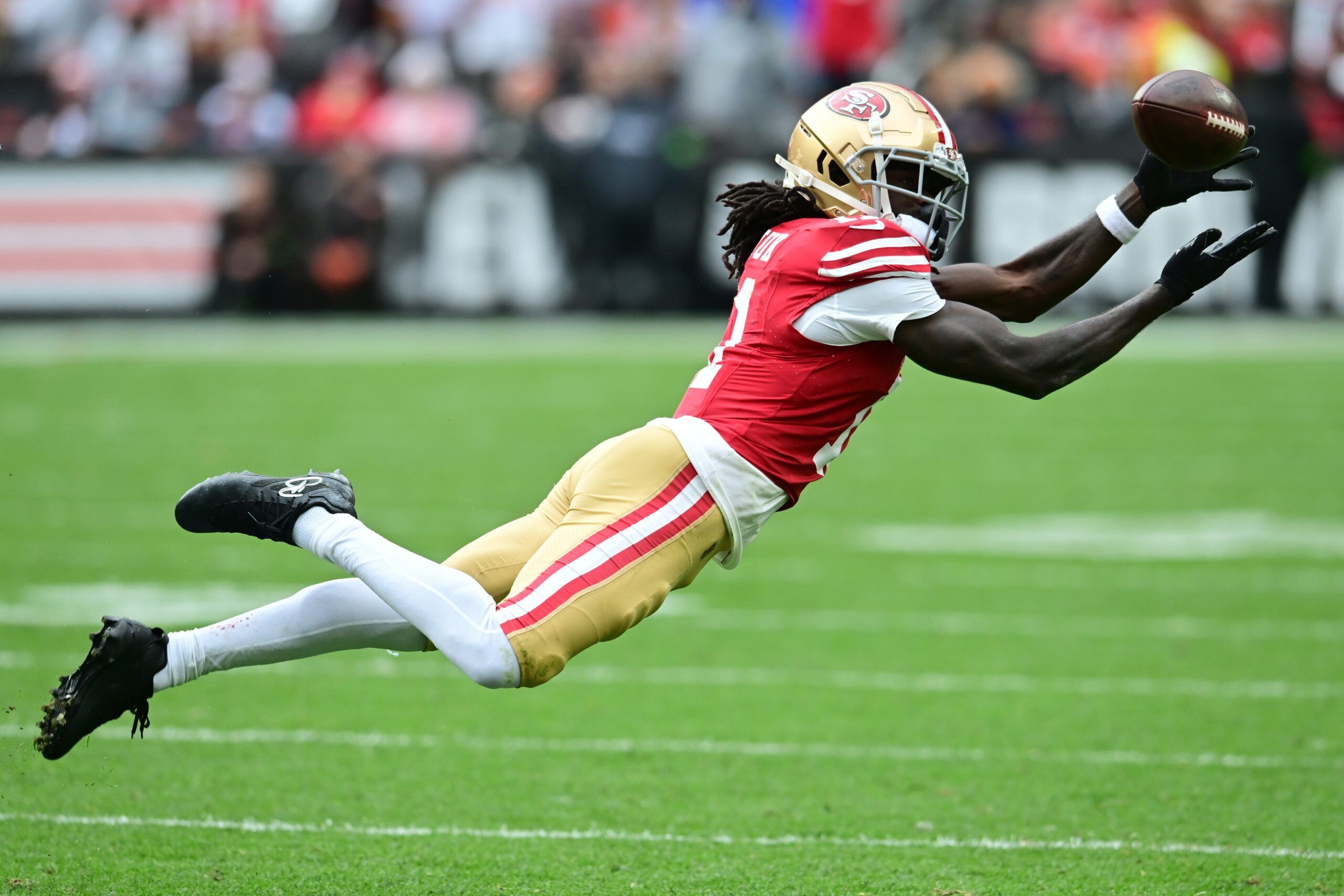 Brandon Aiyuk (11) just misses a catch during the second half against the Cleveland Browns at Cleveland Browns Stadium.