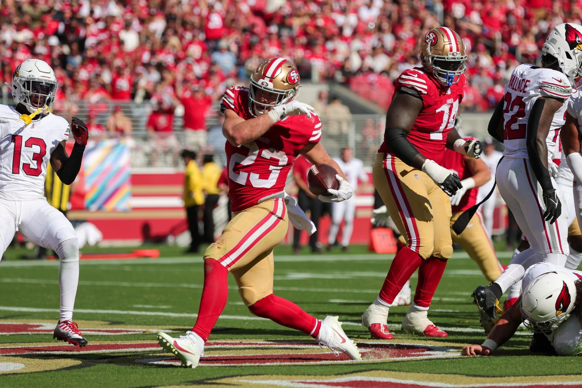 San Francisco 49ers RB Christian McCaffrey scores a touchdown against the Arizona Cardinals.