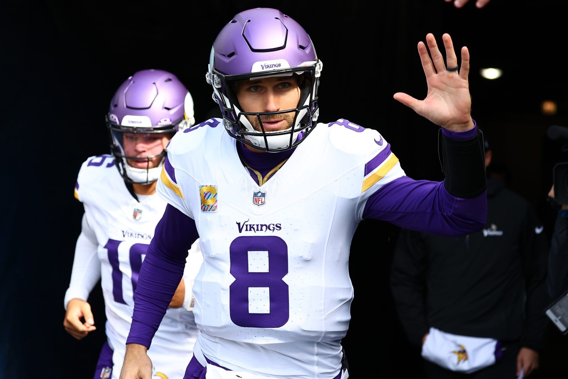 Kirk Cousins (8) takes the field before the game against the Chicago Bears at Soldier Field.