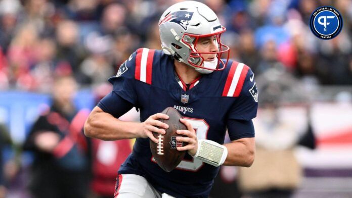 Mac Jones (10) looks to throw against the Buffalo Bills during the second half at Gillette Stadium.