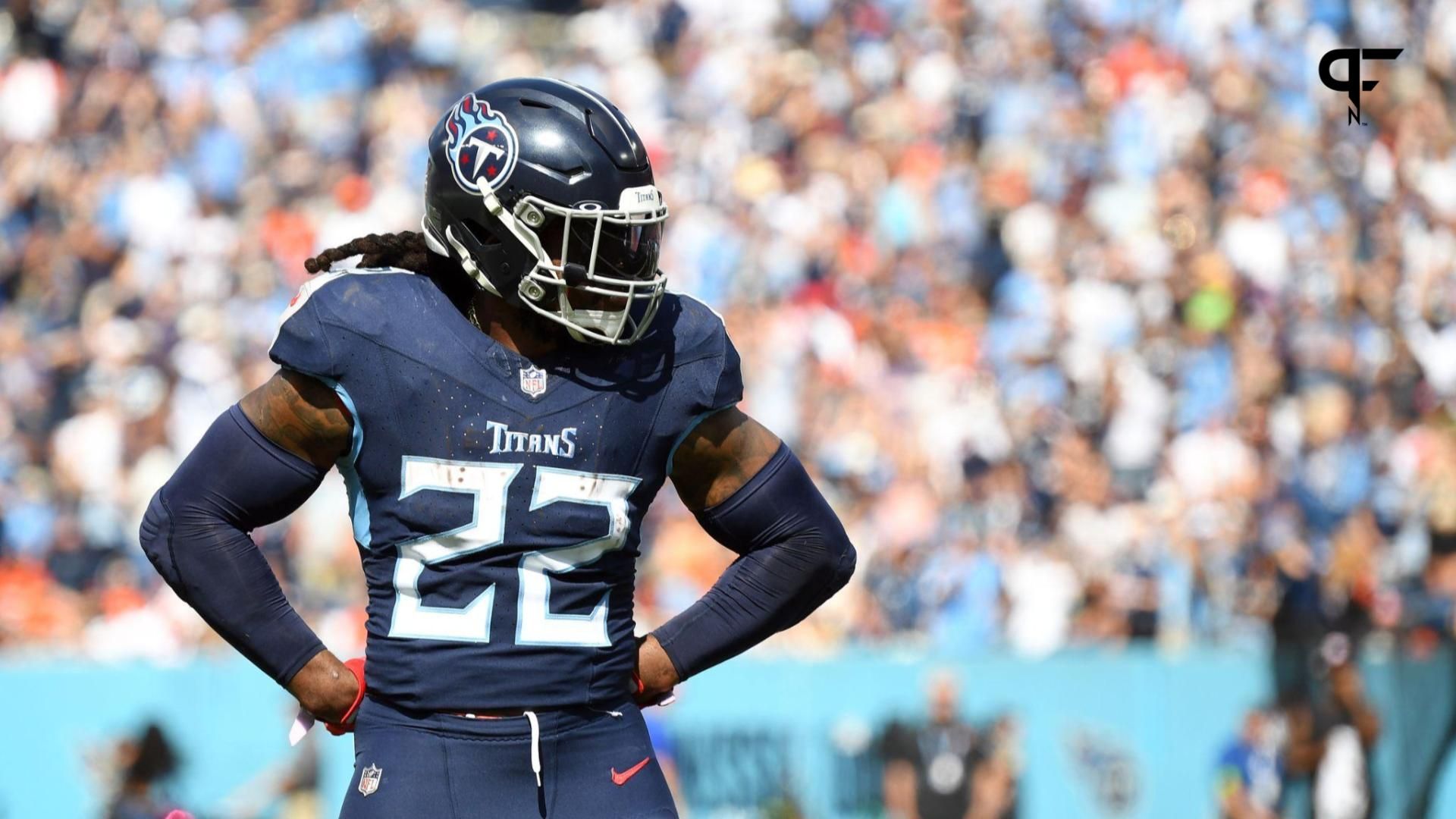 Tennessee Titans running back Derrick Henry (22) celebrates after throwing a touchdown pass during the first half against the Cincinnati Bengals at Nissan Stadium.