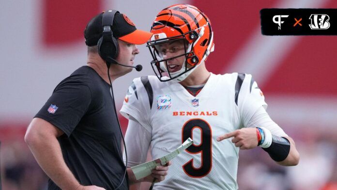 Cincinnati Bengals head coach Zac Taylor and Cincinnati Bengals quarterback Joe Burrow (9) talk during the first half of the game against the Arizona Cardinals at State Farm Stadium.