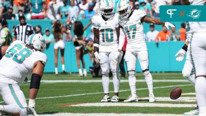 Miami Dolphins wide receiver Jaylen Waddle (17) celebrates his touchdown with wide receiver Tyreek Hill (10) during the first half of an NFL game against the Carolina Panthers at Hard Rock Stadium in Miami Gardens, Oct. 15, 2023.