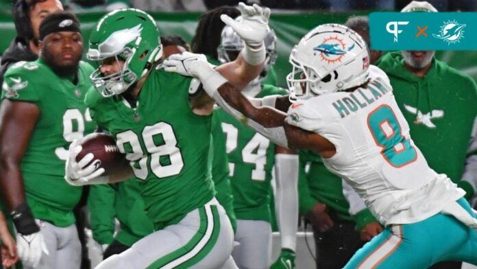 Philadelphia Eagles tight end Dallas Goedert (88) is pushed out of bounds by Miami Dolphins safety Jevon Holland (8) during the first quarter at Lincoln Financial Field.