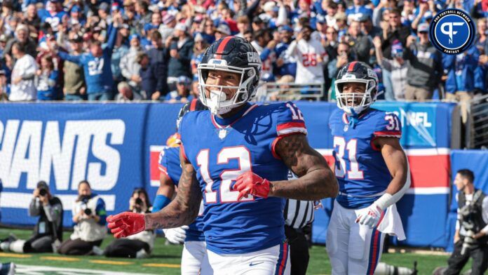 New York Giants tight end Darren Waller (12) celebrates his touchdown reception during the first half against the Washington Commanders at MetLife Stadium.