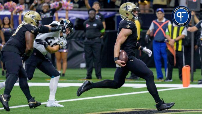 New Orleans Saints quarterback Taysom Hill (7) scores a touchdown against the Jacksonville Jaguars.