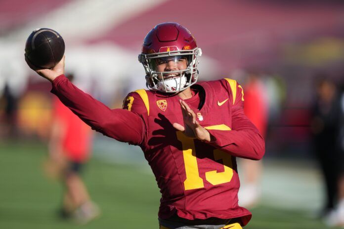 USC Trojans QB Caleb Williams (13) throws a pass during warmups.