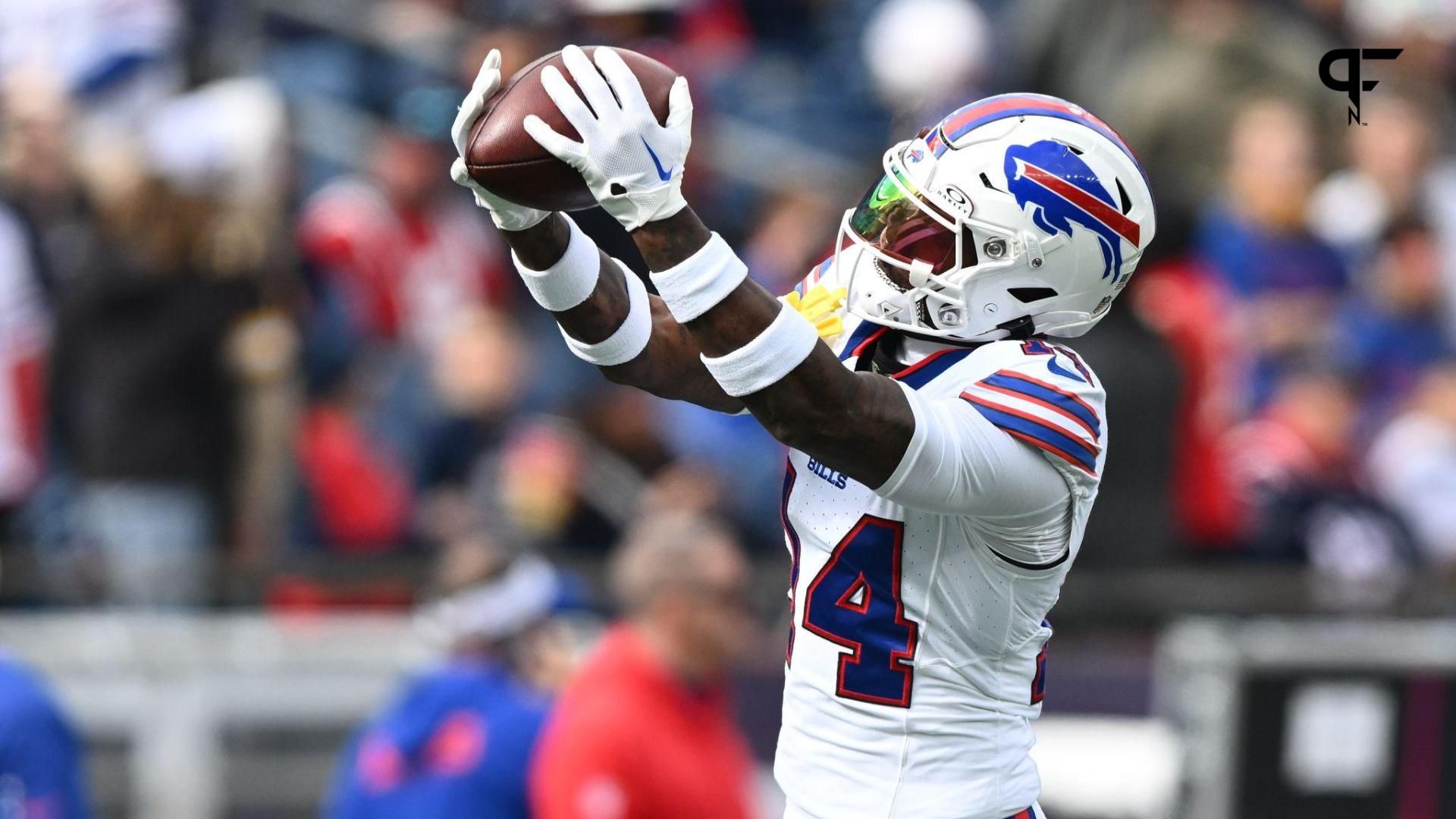 Buffalo Bills wide receiver Stefon Diggs (14) makes a catch during warmups before a game against the New England Patriots at Gillette Stadium.