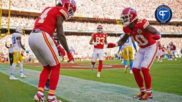 Kansas City Chiefs WR Rashee Rice (4) and RB Isiah Pacheco (10) celebrate a touchdown.