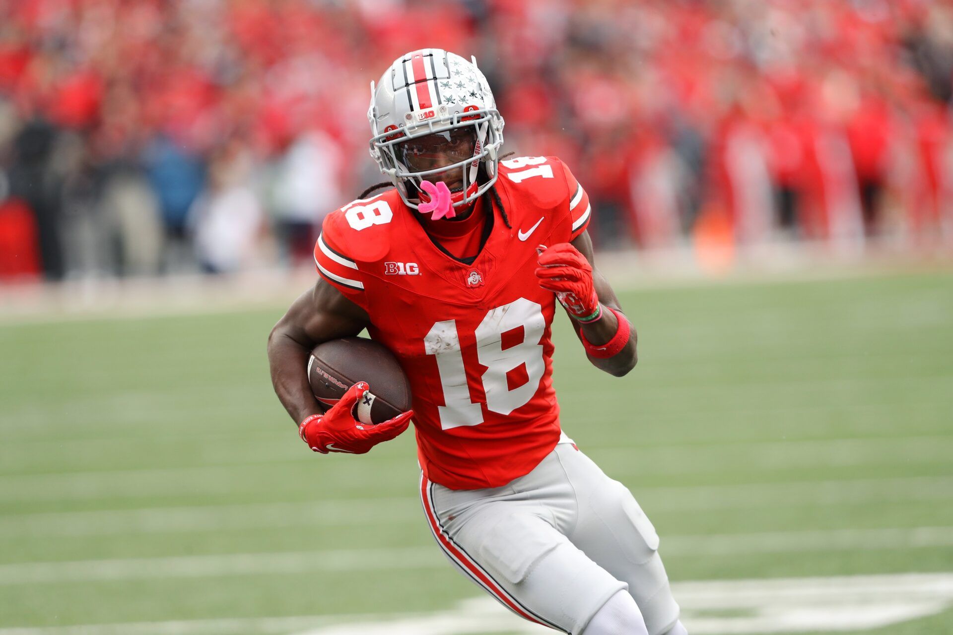 Ohio State Buckeyes wide receiver Marvin Harrison Jr. (18) scores a touchdown against the Penn State Nittany Lions during the fourth quarter at Ohio Stadium.