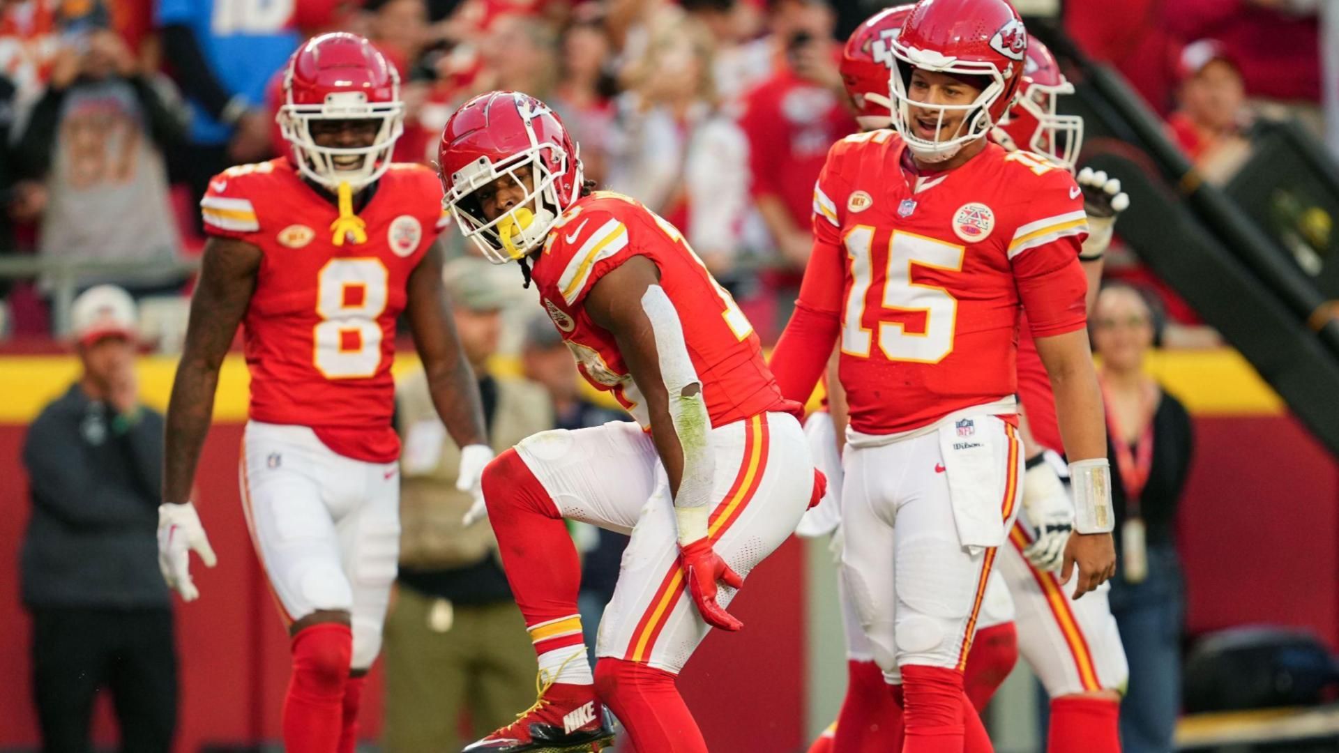 Kansas City Chiefs running back Isiah Pacheco (10) celebrates with quarterback Patrick Mahomes (15) during the second half against the Los Angeles Chargers at GEHA Field at Arrowhead Stadium.