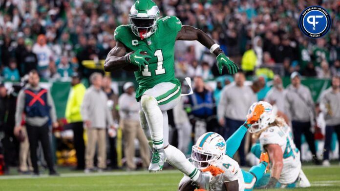 Philadelphia Eagles wide receiver A.J. Brown (11) runs for a touchdown past Miami Dolphins cornerback Kader Kohou (4).