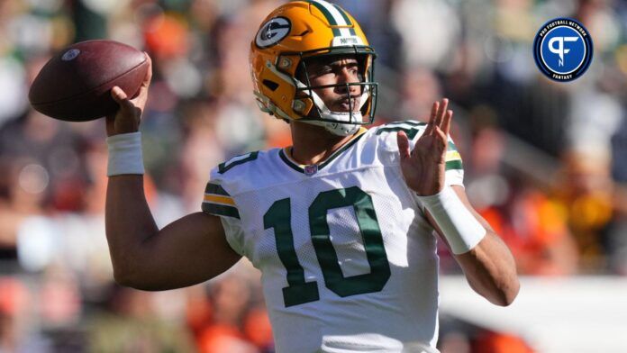 Green Bay Packers quarterback Jordan Love (10) prepares to pass in the second quarter against the Denver Broncos at Empower Field at Mile High.