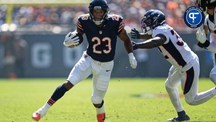 Chicago Bears running back Roschon Johnson (23) runs with the ball against the Denver Broncos.