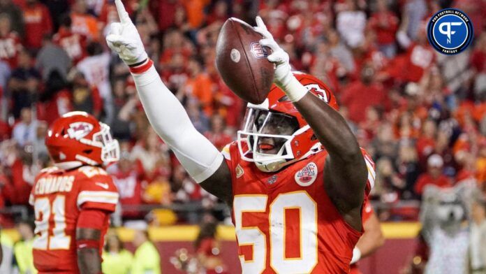 Willie Gay (50) celebrates after recovering a fumble against the Denver Broncos during the second half at GEHA Field at Arrowhead Stadium.