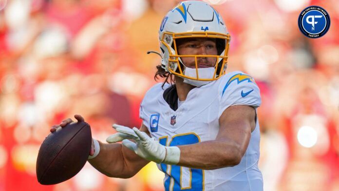 Justin Herbert (10) throws a pass during the second half against the Kansas City Chiefs at GEHA Field at Arrowhead Stadium.