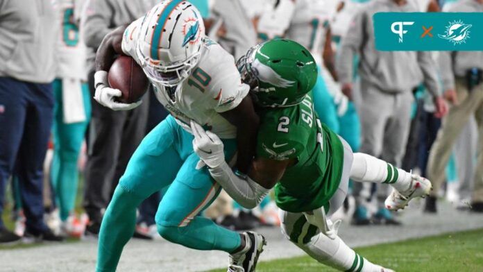 Tyreek Hill (10) is tackled by Philadelphia Eagles cornerback Darius Slay (2) during the first quarter at Lincoln Financial Field.