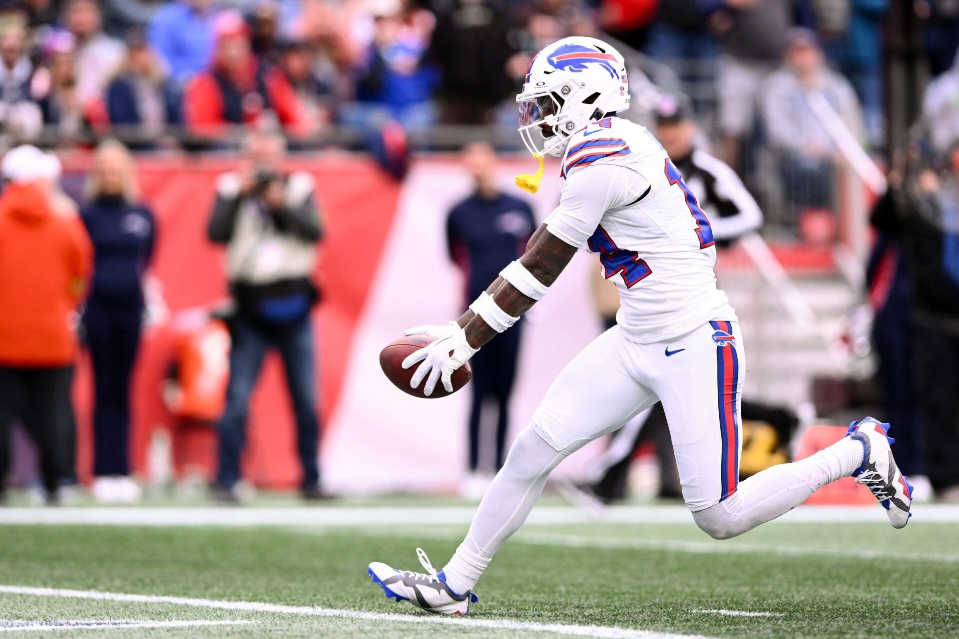 Buffalo Bills WR Stefon Diggs (14) catches a TD pass against the New England Patriots.