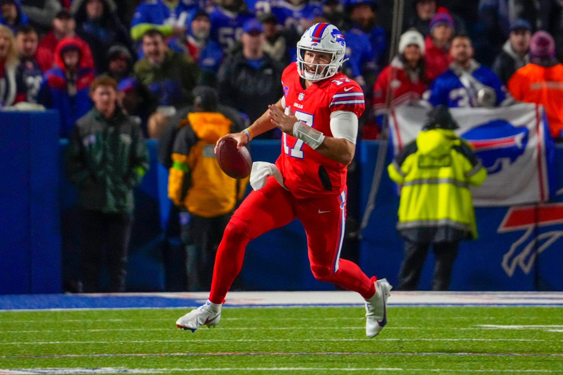 Buffalo Bills quarterback Josh Allen (17) runs with the ball against the New York Giants during the second half at Highmark Stadium.