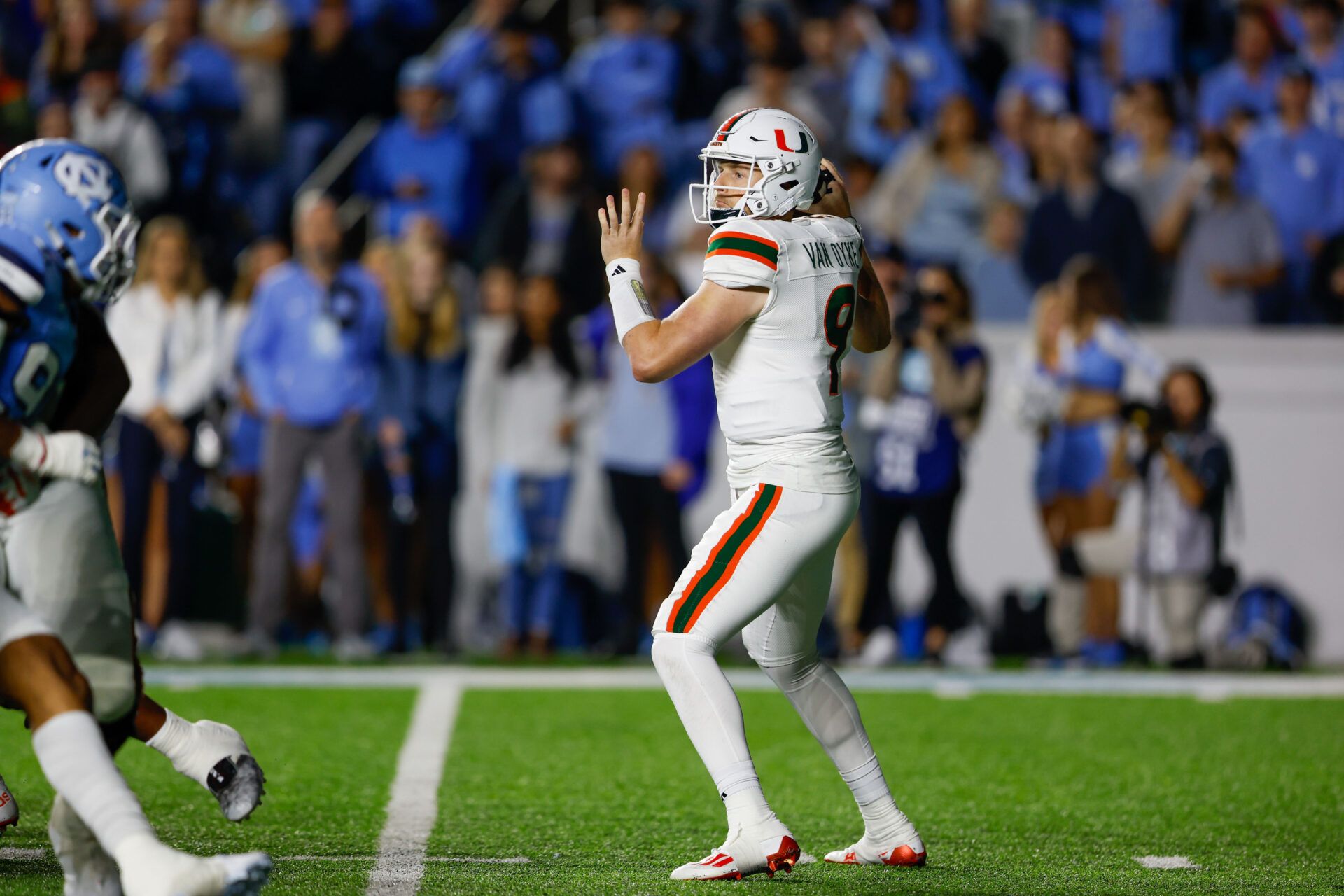 Miami Hurricanes quarterback Tyler Van Dyke (9) looks to pass against the North Carolina Tar Heels in the first half at Kenan Memorial Stadium.