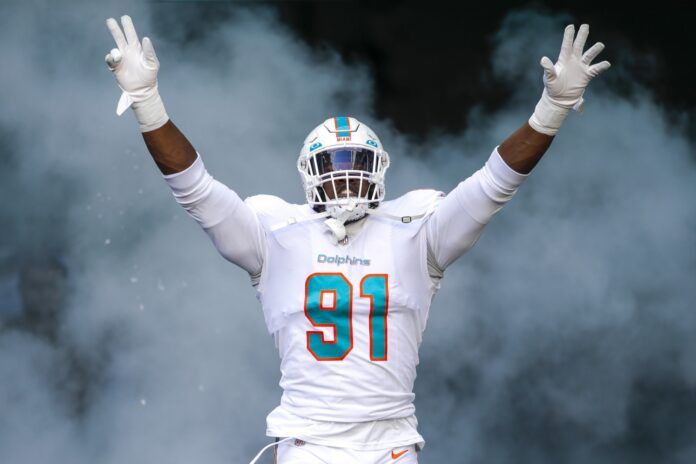 Miami Dolphins defensive end Emmanuel Ogbah (91) takes the field prior to the game against the Cleveland Browns at Hard Rock Stadium.