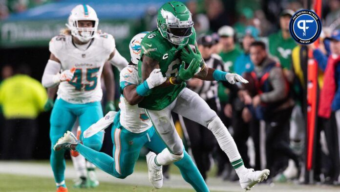 Philadelphia Eagles wide receiver DeVonta Smith (6) runs with the ball after a catch in front of Miami Dolphins cornerback Eli Apple (33) during the third quarter at Lincoln Financial Field.