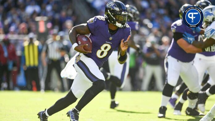 Baltimore Ravens quarterback Lamar Jackson (8) rushes during the first half against the Detroit Lions at M&T Bank Stadium.