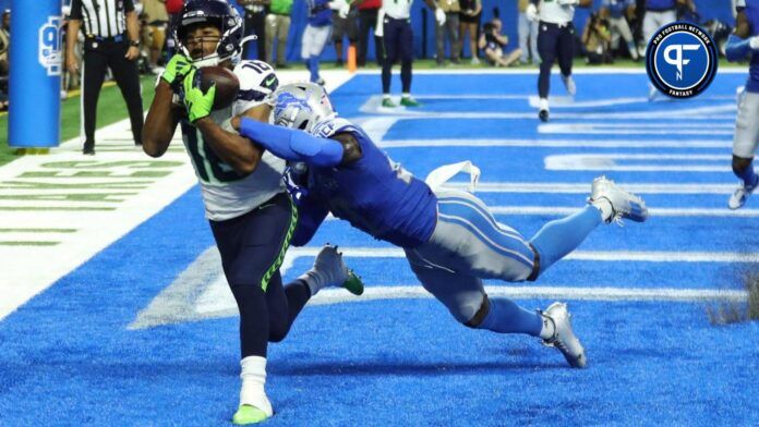 Seattle Seahawks wide receiver Tyler Lockett (16) catches a touchdown against Detroit Lions cornerback Jerry Jacobs (23) during the second half at Ford Field.