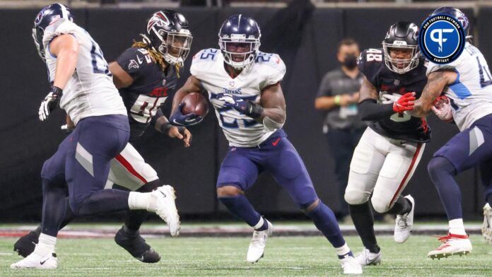 Tennessee Titans running back Brian Hill (25) runs the ball against the Atlanta Falcons during their game at Mercedes-Benz Stadium.