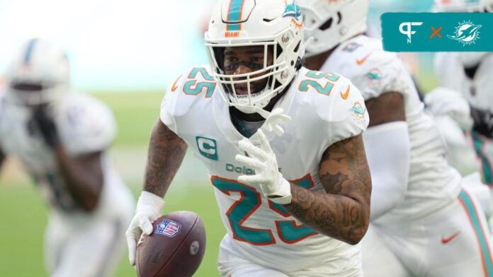 Miami Dolphins CB Xavien Howard runs with the football.