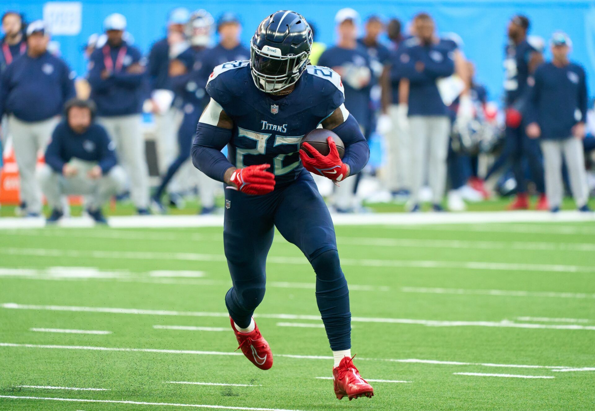 Derrick Henry (22) runs in for a touchdown during the second half of an NFL International Series game at Tottenham Hotspur Stadium.