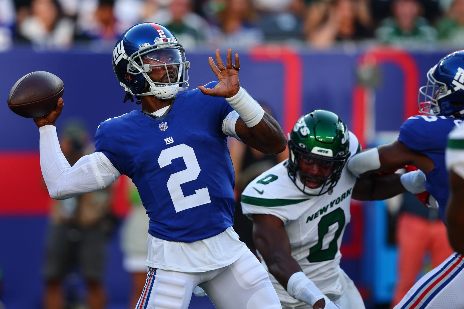 New York Giants quarterback Tyrod Taylor (2) throws a pass against the New York Jets during the first half at MetLife Stadium.