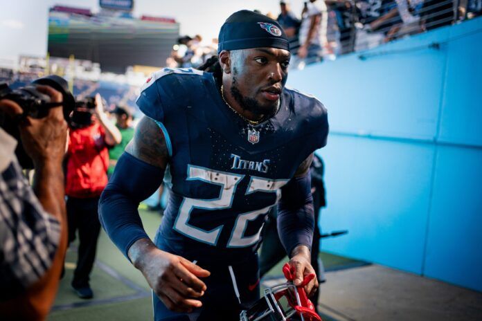 Derrick Henry (22) heads to the locker room after defeating the Cincinnati Bengals at Nissan Stadium.