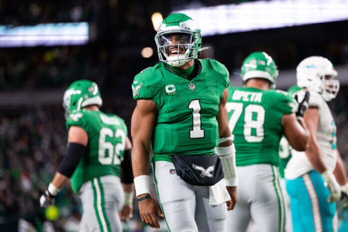 Jalen Hurts (1) reacts after a running back Kenneth Gainwell (not pictured) touchdown run against the Miami Dolphins during the fourth quarter at Lincoln Financial Field.